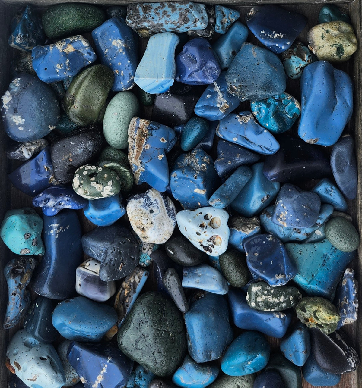 Leland Blue pieces in shades of blue, teal, and green
