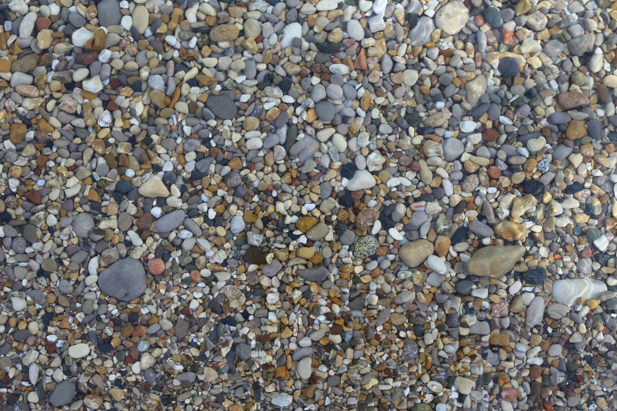Small stones along a Lake Michigan shoreline