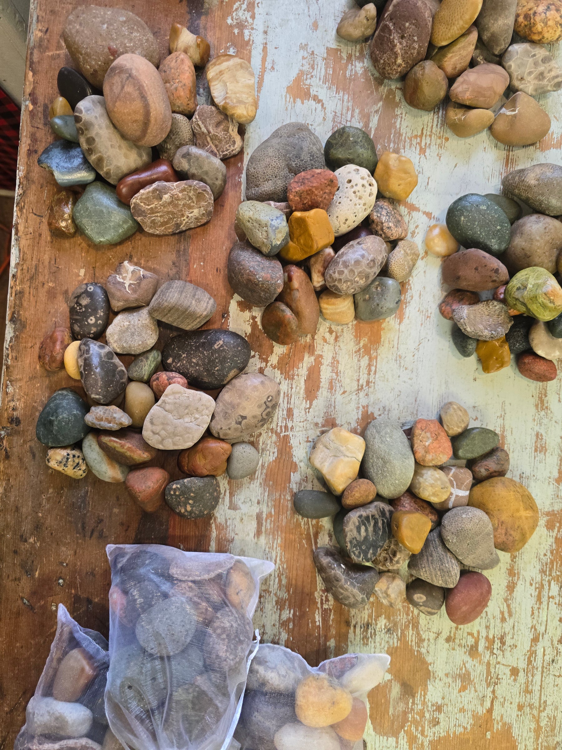 A collection of real Michigan stones on the worktable at Northport Trading Post